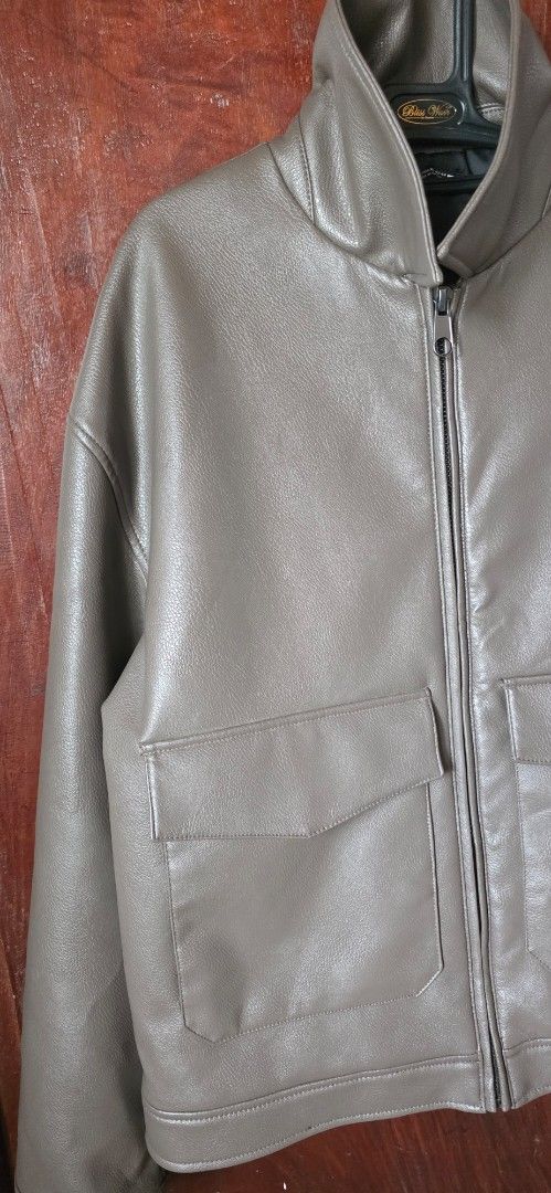 Zara Faux Leather Jacket (Category: Coats, Jackets and Outerwear) located in Santa Maria. Submitted by ellahqy28 (Listing ID 1462181908, Image 2). Description: - Cool taupe faux leather jacket from Zara - Features a zip-up front - Two chest pockets for added detail and utility - Versatile for both casual and slightly dressier occasions - Excellent for layering.