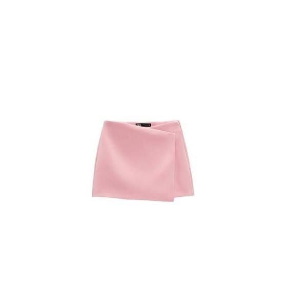 Zara Pink Asymmetrical Wrap Skort (Category: Shorts) located in General Trias. Submitted by 1992thelabel (Listing ID 1462149503, Image 2). Description: Selling to feed more bellies! 🐶🐱Proceeds go to my rescue dogs, cats & strays. Your purchase would mean a lot! Thank you 🐾 - Cute pink mini skirt from Zara - Features an asymmetrical wrap design - Best fits size XS or S - Versatile for dressing up or down - Ideal for spring and summer outfits - 