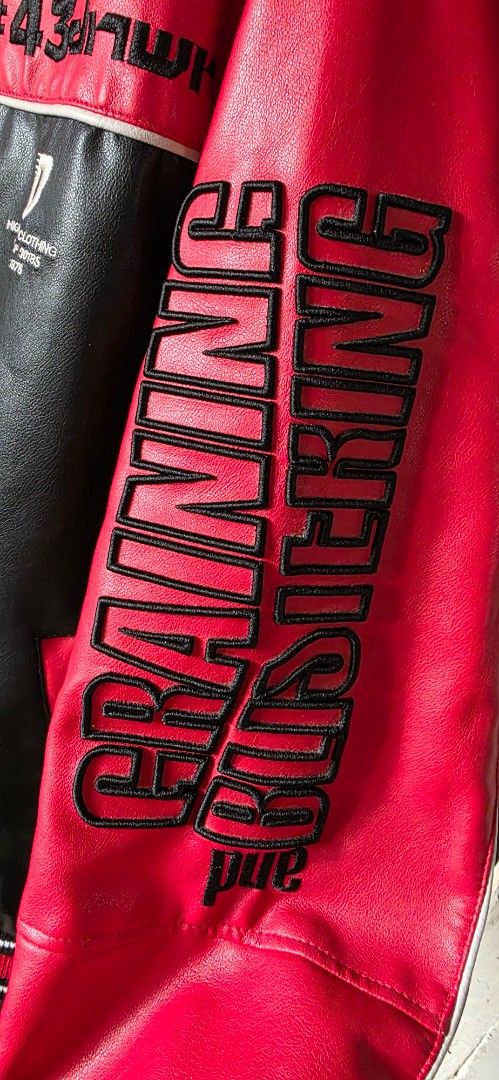 ZARA Red & Black Varsity Jacket (Category: Coats, Jackets and Outerwear) located in Santa Maria. Submitted by ellahqy28 (Listing ID 1462181746, Image 2). Description: - Cool red and black varsity jacket from ZARA. - Features embroidered details and patches. - Racing or biker style design. - Button-up front closure. - Ideal for a streetwear look. - Check photos for all graphics..