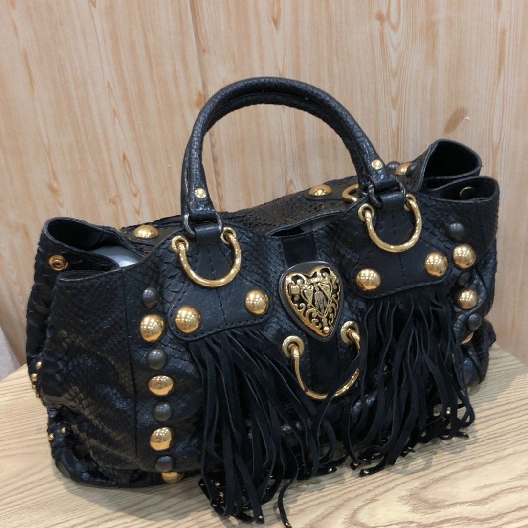 267008908 GUCCI BAG 207301 PYTHON WITH FRINGE (Category: Luxury Bags & Wallets) located in Taguig. Submitted by ecoring.ph (Listing ID 1462282444, Image 1). Description: ◆CONDITION: B ◆DESCRIPTIONS: (Other defects/info:) OUTER: The body of the bag has scratches, scuffs, stains, and dirt, wrinkles, deformed, press marks, and shows signs of use. The bottom and bottom corners of the bag are also has scratches, scuffs, stains, and dirt, wrinkles, def