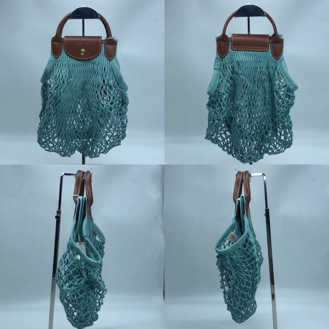 267008966 LONGCHAMP BAG MEDIUM KNIT BLUE (Category: Luxury Bags & Wallets) located in Taguig. Submitted by ecoring.ph (Listing ID 1462281026, Image 2). Description: ◆CONDITION: AB ◆DESCRIPTIONS: (Other defects/info:) The flap and top handle of the bag have minimal scratches and press marks. The rubber lining of the bag has a minor crack. Overall, the bag remains in good, new condition. ◆SIZE: ⁎WIDTH: 34cm. (approximately only) *HEIGHT: 30cm. (app