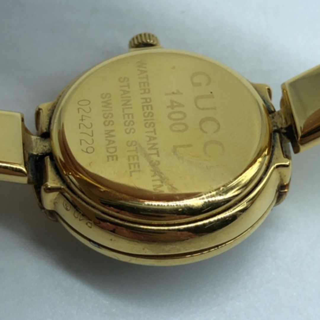 267009057 GUCCI WATCH 1400L (Category: Luxury Watches) located in Taguig. Submitted by ecoring.ph (Listing ID 1462280019, Image 3). Description: ◆CONDITION: B- ◆DESCRIPTIONS: (Other defects/info:) The bezel, case back, end pieces, crown, wrist bangle, and clasp of the watch are scratched, have minimal dents, stains, dirt, and oxidation, and show signs of use. The screws at the end pieces and closing area of the watch are faded, dented, scratched,