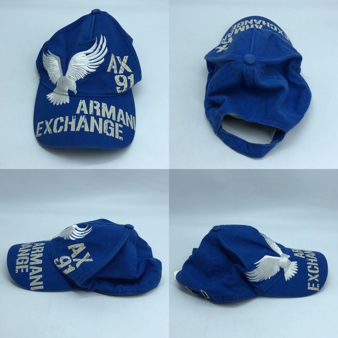 267009109 ARMANI EXCHANGE CAP BLUE (Category: Caps & Hats) located in Taguig. Submitted by ecoring.ph (Listing ID 1462284570, Image 2). Description: ◆CONDITION: B ◆DESCRIPTIONS: (Other defects/info:) The body of the cap is stained, dirty, slightly discolored, and shows signs of use. The underside of the cap is also stained, dirty, discolored, and shows signs of use. The hardware buckle of the cap is scratched, has minimal dents, and shows signs o