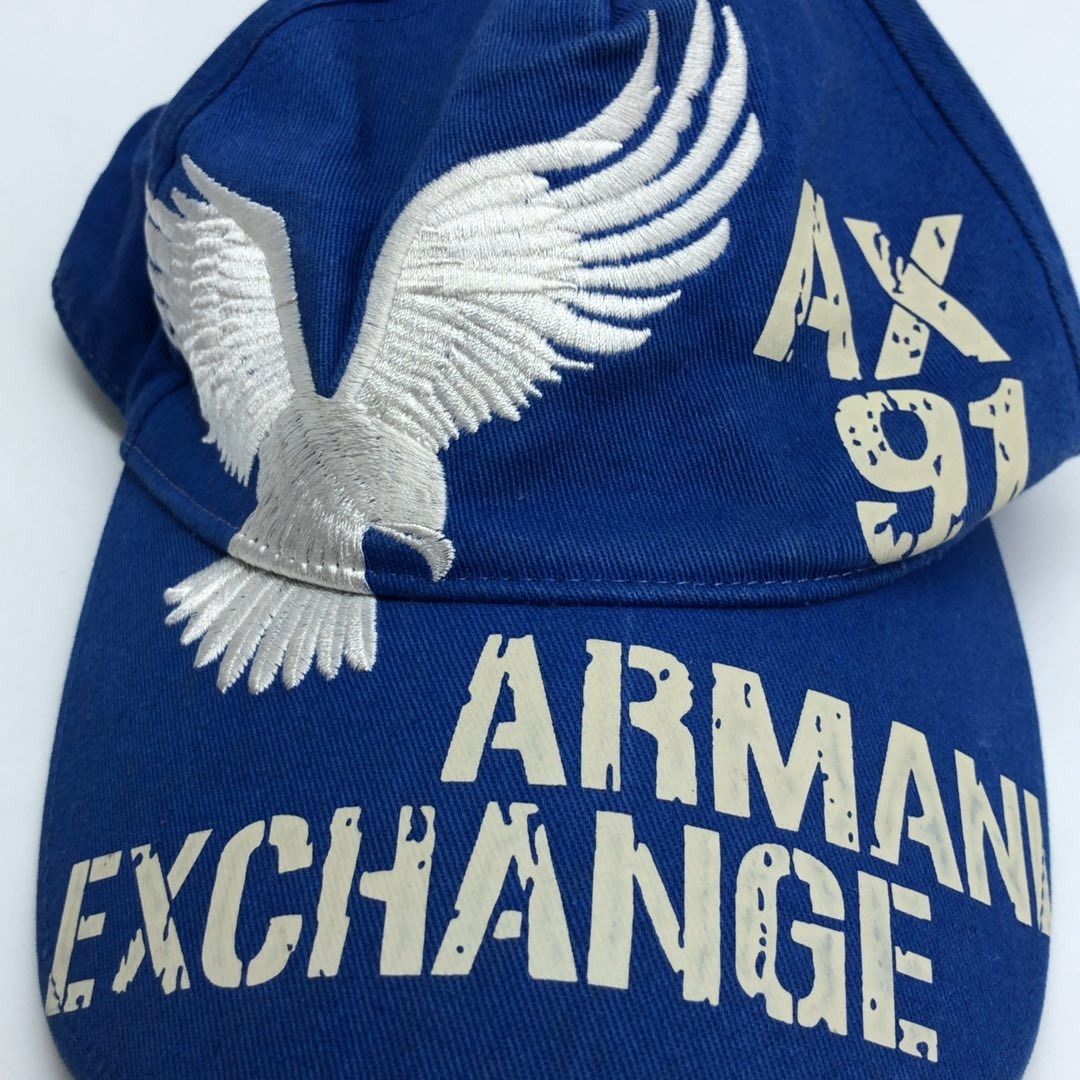 267009109 ARMANI EXCHANGE CAP BLUE (Category: Caps & Hats) located in Taguig. Submitted by ecoring.ph (Listing ID 1462284570, Image 3). Description: ◆CONDITION: B ◆DESCRIPTIONS: (Other defects/info:) The body of the cap is stained, dirty, slightly discolored, and shows signs of use. The underside of the cap is also stained, dirty, discolored, and shows signs of use. The hardware buckle of the cap is scratched, has minimal dents, and shows signs o