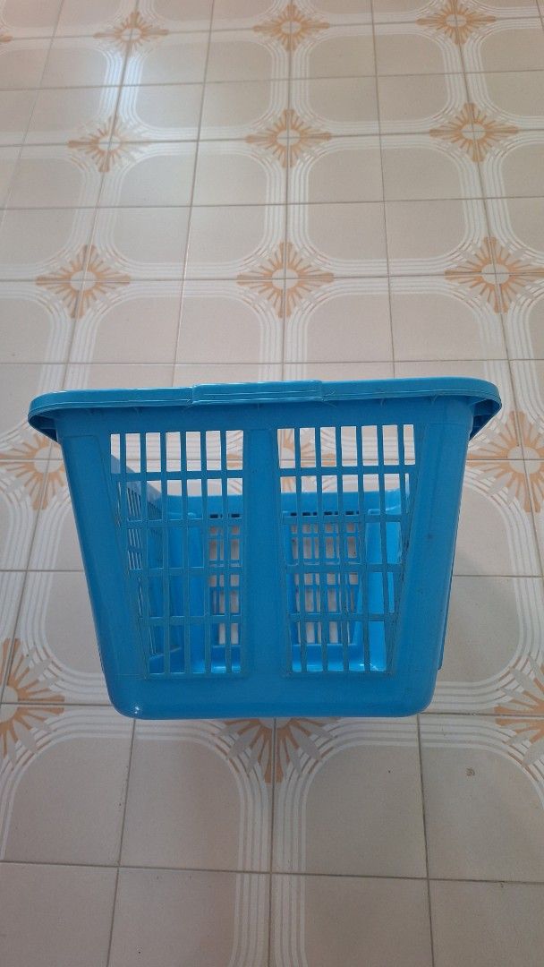2 Plastic Rectangular Laundry Baskets (Category: Storage Boxes & Baskets) located in Singapore. Submitted by lg3210 (Listing ID 1462294939, Image 3). Description: - 2 plastic laundry baskets. - Colors: 1 Red, 1 Blue. - Shape: Rectangular. - Design: Slatted for ventilation - Material: Sturdy plastic - Features: Side handles for easy carrying. - Uses: Laundry or general storage. - No crack. - $10.00 each. 2 for $15.00. - Size: length 57cm, width 41