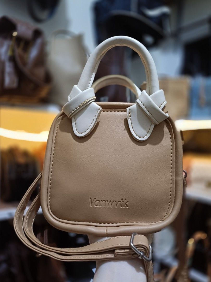 2-way mini sling bag crossbody bag (Category: Cross-body Bags) located in Bocaue. Submitted by bags.and.beyond (Listing ID 1462318874, Image 1). Description: in good condition but needs cleaning sa inside part.