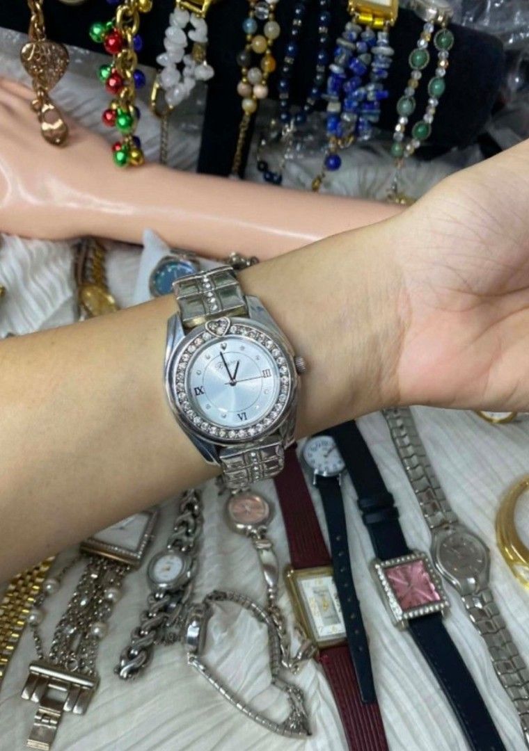 ✨ BRIGHTON Dana Point Silver Crystal Accent Watch ✨ (Category: Women's Watches) located in Manila. Submitted by shopyourstyleph (Listing ID 1462371872, Image 3). Description: Model: Dana Point Design: Features a silver-plated finish, a distinct signature etched heart accent directly above the 12 o'clock marker, a crystal-encrusted bezel, and a patterned metallic link bracelet. Dial: Light silver dial displaying Roman numerals at the primary hours