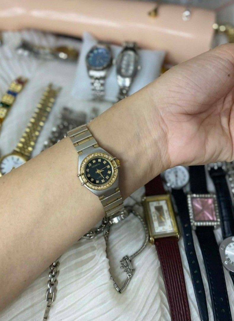 ✨ GENEVA Two Tone Constellation Ladies Watch ✨ (Category: Women's Watches) located in Manila. Submitted by shopyourstyleph (Listing ID 1462328159, Image 2). Description: Elegant Omega Constellation dupe watch with a black dial and gold-tone accents. Features a stainless steel and gold-tone bracelet. A classic timepiece suitable for everyday wear or special occasions..
