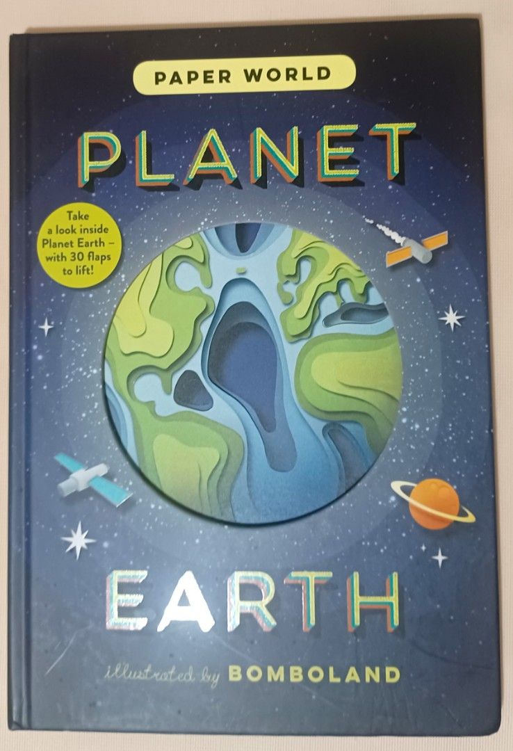 🌍 PAPER WORLD: PLANET EARTH – Interactive Hardcover Book (Category: Children's Books) located in Quezon City. Submitted by wjmae (Listing ID 1462363487, Image 1). Description: Illustrated by Bomboland • Published by Templar ✨ A GEOGRAPHY BOOK THAT LITERALLY COMES TO LIFE! ✨ This isn’t just a book — it’s a journey! Dive deep into our amazing planet with stunning layered paper-cut art, 30 lift-the-flaps, and see-through die-cut pages on every spre