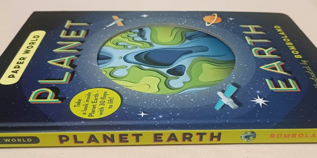 🌍 PAPER WORLD: PLANET EARTH – Interactive Hardcover Book (Category: Children's Books) located in Quezon City. Submitted by wjmae (Listing ID 1462363487, Image 3). Description: Illustrated by Bomboland • Published by Templar ✨ A GEOGRAPHY BOOK THAT LITERALLY COMES TO LIFE! ✨ This isn’t just a book — it’s a journey! Dive deep into our amazing planet with stunning layered paper-cut art, 30 lift-the-flaps, and see-through die-cut pages on every spre