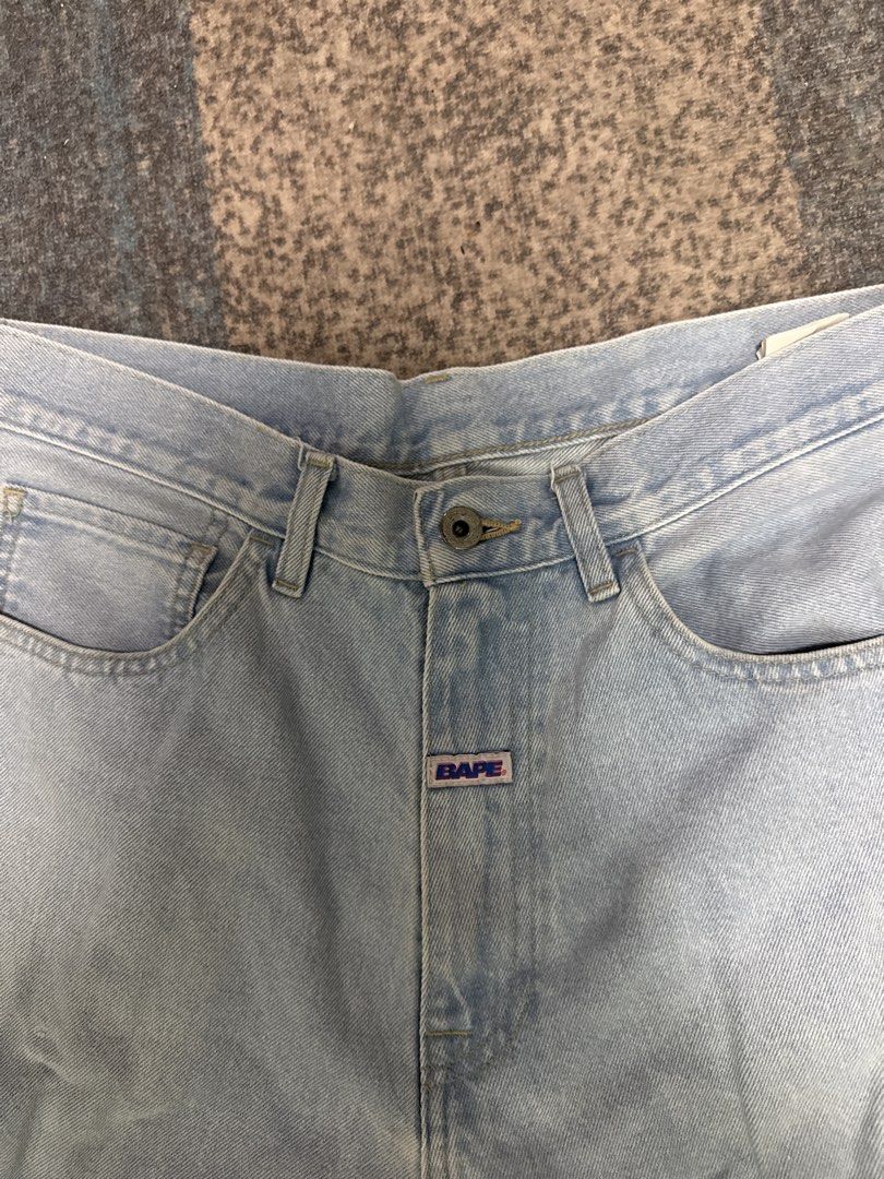 A Bathing Ape BAPE Light Wash Denim Jeans L (Category: Voice Recorders) located in Angeles City. Submitted by migs_font29 (Listing ID 1462395062, Image 2). Description: - Brand: A Bathing Ape (BAPE) - Type: Light Wash Denim Jeans - Size: L - Material: 100% Cotton - Origin: Made in Japan - Features: Iconic BAPE star logo embroidered on back pocket.