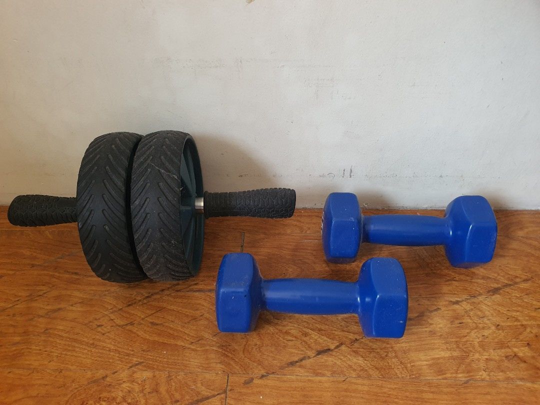 Ab Roller Wheel and 2x 4KG Dumbbells Set (Category: Weights & Dumbbells) located in Paranaque City. Submitted by nicessities (Listing ID 1462300772, Image 1). Description: - Ab roller wheel with double wheel for extra stability - Comfortable, grippy handles on the ab roller - Two 4kg dumbbells included, perfect for strength training - Dumbbells are blue and clearly marked 4KG - Ideal for core exercises and a full body workout at home.