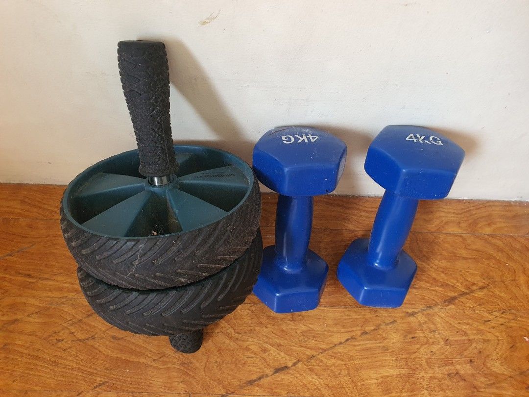 Ab Roller Wheel and 2x 4KG Dumbbells Set (Category: Weights & Dumbbells) located in Paranaque City. Submitted by nicessities (Listing ID 1462300772, Image 2). Description: - Ab roller wheel with double wheel for extra stability - Comfortable, grippy handles on the ab roller - Two 4kg dumbbells included, perfect for strength training - Dumbbells are blue and clearly marked 4KG - Ideal for core exercises and a full body workout at home.