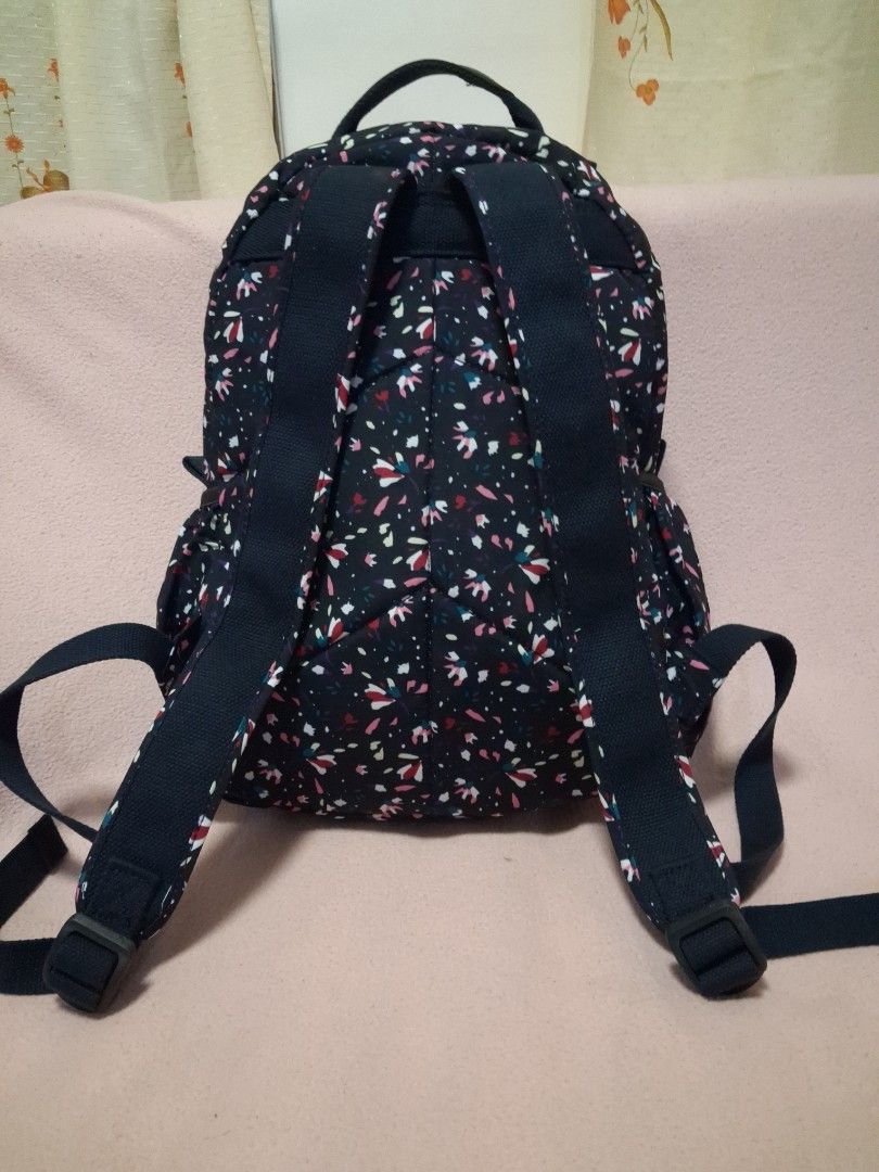 ABBA Backpack - Navy Floral Print (Category: Backpacks) located in Angeles City. Submitted by anneps (Listing ID 1462406264, Image 2). Description: - Cute navy backpack with a fun floral print. - Features multiple inner pockets for organization. - Smoothly working zippers. - Adjustable straps for a comfortable fit. - Ideal for everyday use or travel. - Approximately 15 inches tall..
