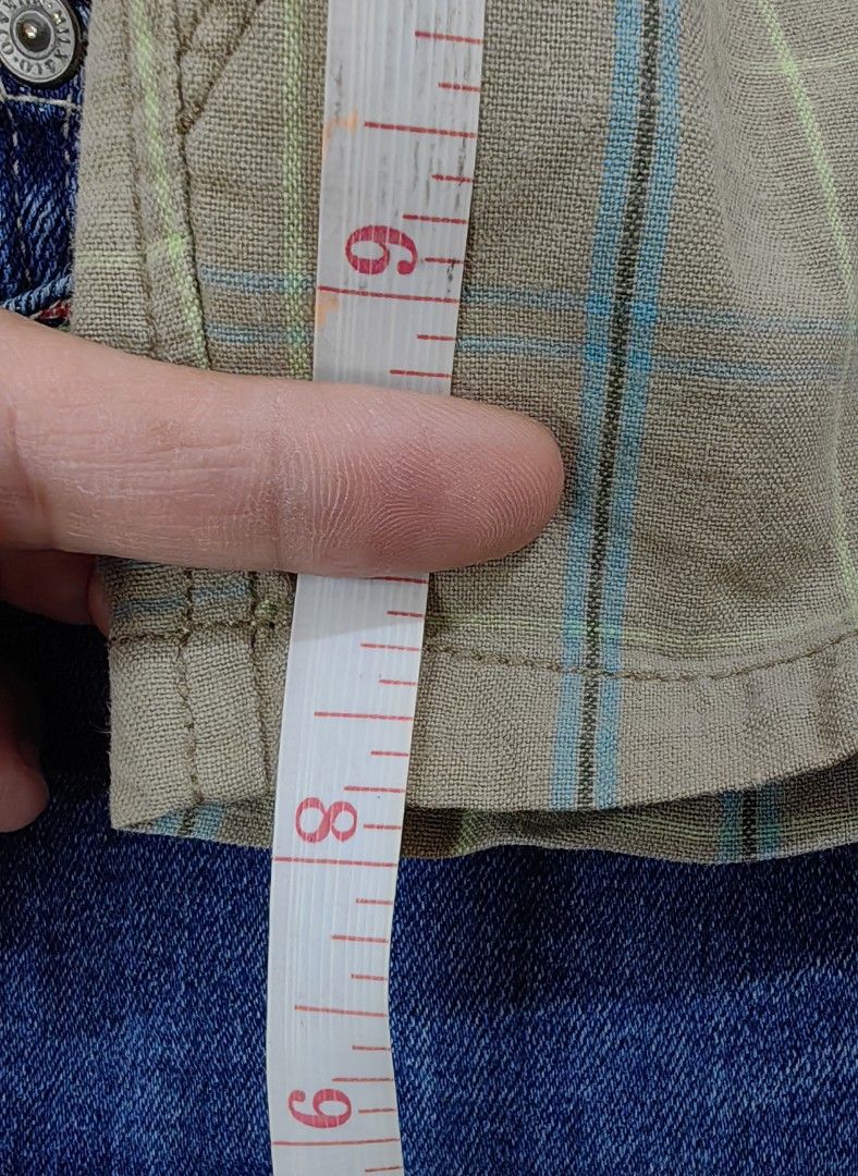 Abercrombie & Fitch Plaid Shorts (Category: Shorts) located in Las Pinas. Submitted by offtonewhome (Listing ID 1462266876, Image 3). Description: - Brand: Abercrombie & Fitch - Color: Brown plaid - Closure: Button and zip - Pockets: Two back pockets with button details - Fabric: Subtle textured - Style: Casual wear.