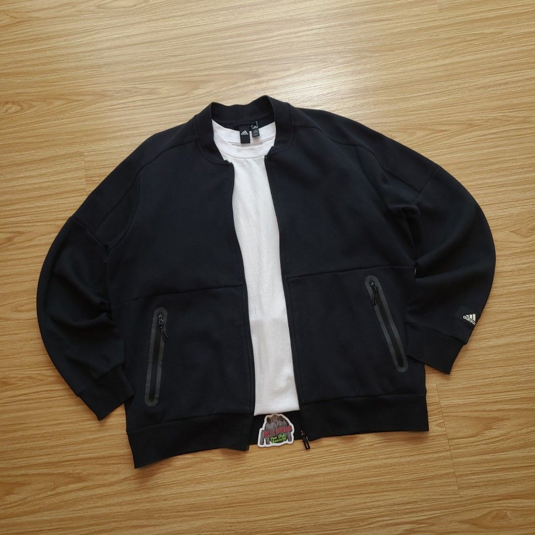 Adidas Black Track Jacket A/2XL (Category: Coats, Jackets and Outerwear) located in Quezon City. Submitted by mofinds.ph (Listing ID 1461908700, Image 1). Description: Size: XXL Dimes: 25x28 Condition: Excellent/Great condition MOP: BPI DELIVER: LALAMOVE OR J&T MEETUP/PICKUP: Victoria Tower D, Mother Ignacia Ave., Brgy. Paligsahan, Diliman, Quezon City.