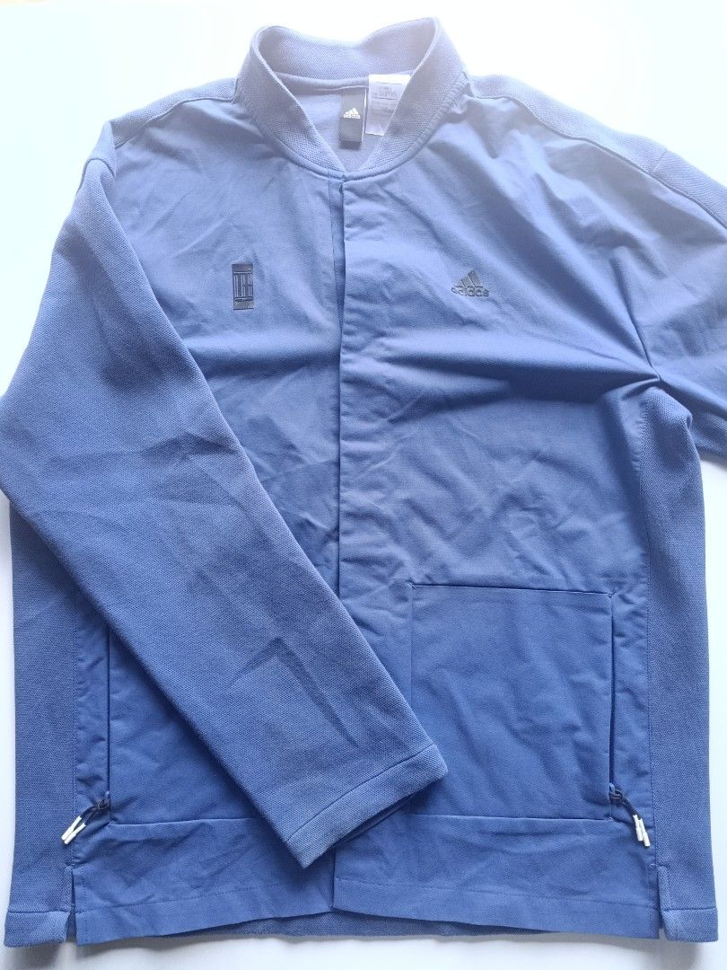 Adidas Blue Track Jacket Snap Button (Category: Coats, Jackets and Outerwear) located in Baguio. Submitted by wear_mo_clothing_shop (Listing ID 1462291135, Image 2). Description: - Blue Adidas jacket - Snap button front closure - Two side pockets with drawstring detail - Size: A/L (180/100A) - Ideal for casual wear or sports -18in chest, 22in lenghth .