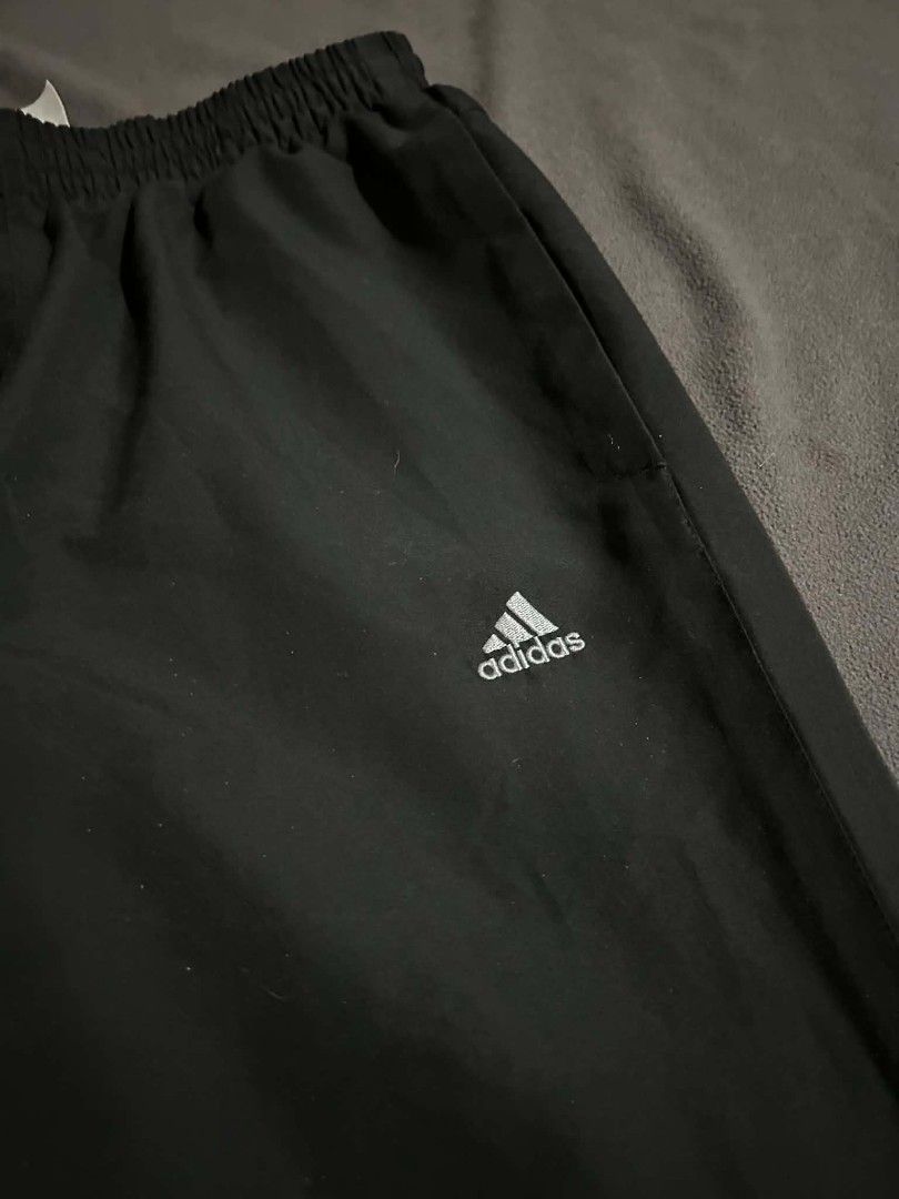 Adidas ClimaCool Track Pants Black Zip Cuffs (Category: Joggers) located in Lipa City. Submitted by olrakk (Listing ID 1462371200, Image 3). Description: Adidas Black Trackpants with Zips Waist: 27-34 Length: 42 Hem: 9.5 (Adjustable with zipper) Excellent condition, no issue!!.