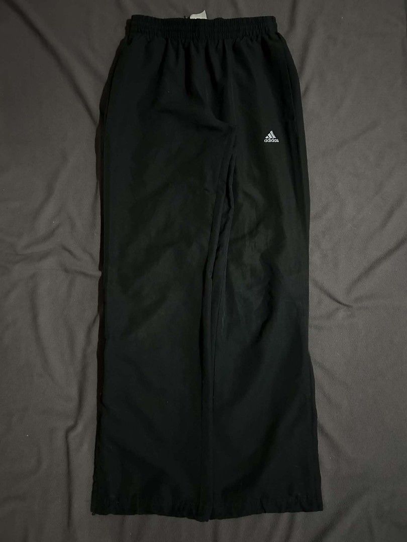 Adidas ClimaCool Track Pants Black Zip Cuffs (Category: Joggers) located in Lipa City. Submitted by olrakk (Listing ID 1462371200, Image 1). Description: Adidas Black Trackpants with Zips Waist: 27-34 Length: 42 Hem: 9.5 (Adjustable with zipper) Excellent condition, no issue!!.