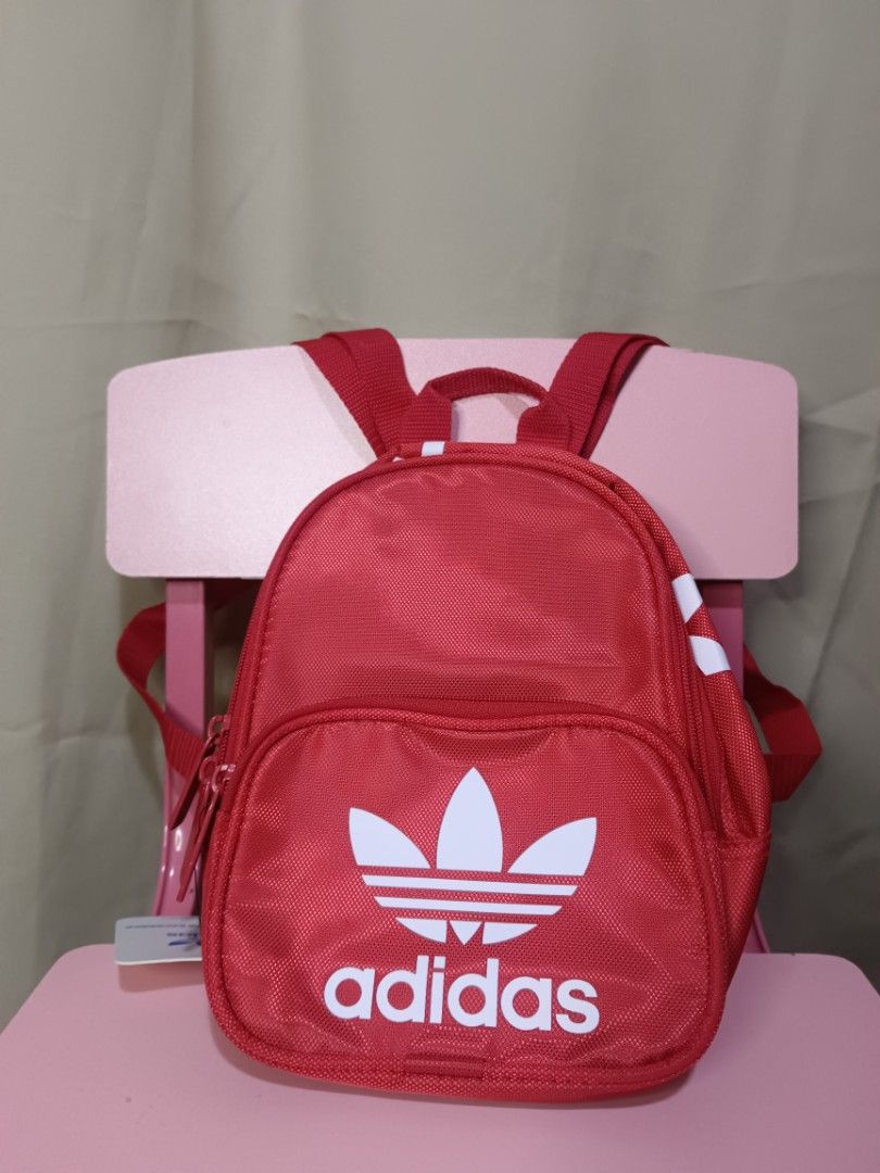 Adidas Mini Backpack - Black or Red (Category: Backpacks) located in Manila. Submitted by rabpisces23 (Listing ID 1462435714, Image 2). Description: - Cute Adidas mini backpacks - Available in black or red - Features the classic Adidas trefoil logo - Perfect for carrying essentials - Great for everyday use or travel - Get yours now!.