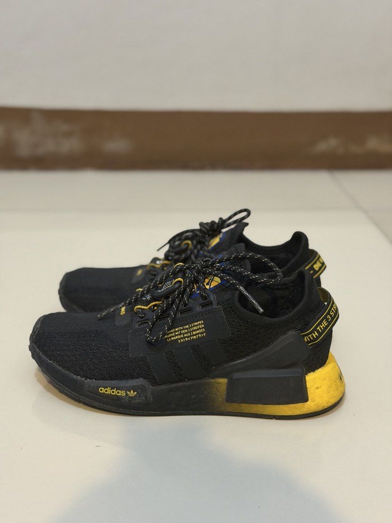 Adidas NMD R1 V2 Black Gradient Yellow (Category: Sneakers) located in Pasig City. Submitted by jgbeautique (Listing ID 1462424537, Image 1). Description: Original price was 1100HKD (7626Php) Bought in HK Still in very good condition Only flaw is that I lost the insole as seen in photo #3 You can use any of your insoles as replacement US 7 for women US 5 for men RFS: Decluttering.