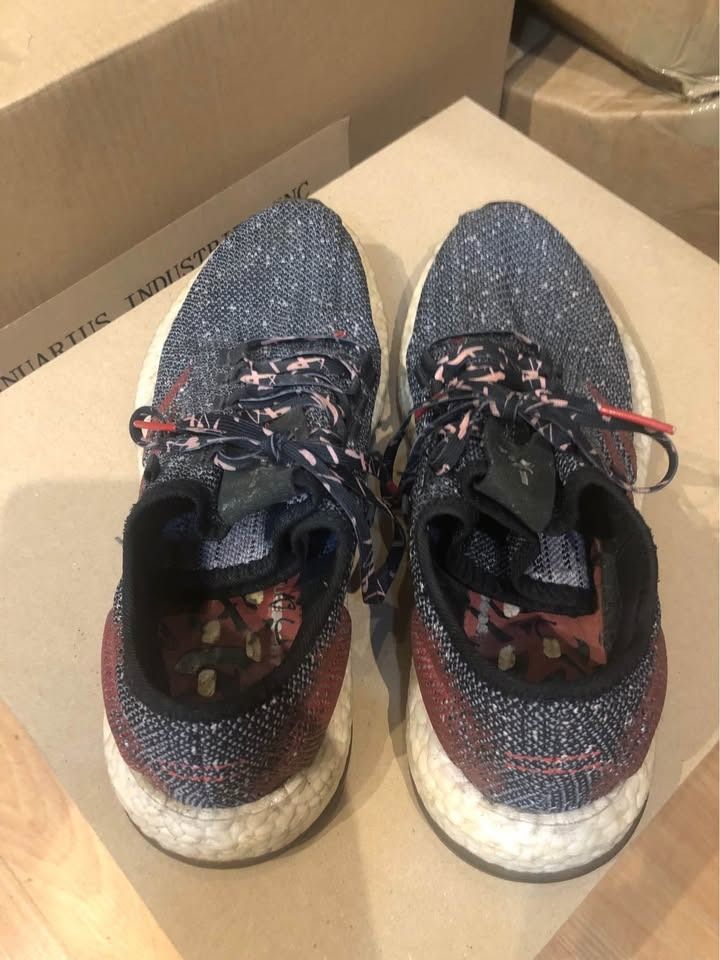 Adidas PureBoost DPR Running Shoes (Category: Sneakers) located in Mandaluyong City. Submitted by ajandriah.s (Listing ID 1462280175, Image 3). Description: - Adidas PureBoost DPR running shoes - Black knit upper with red accents - Patterned laces - Responsive Boost midsole for ultimate comfort - Versatile for running and casual wear - Minor signs of wear on soles and uppers, but plenty of life remaining.