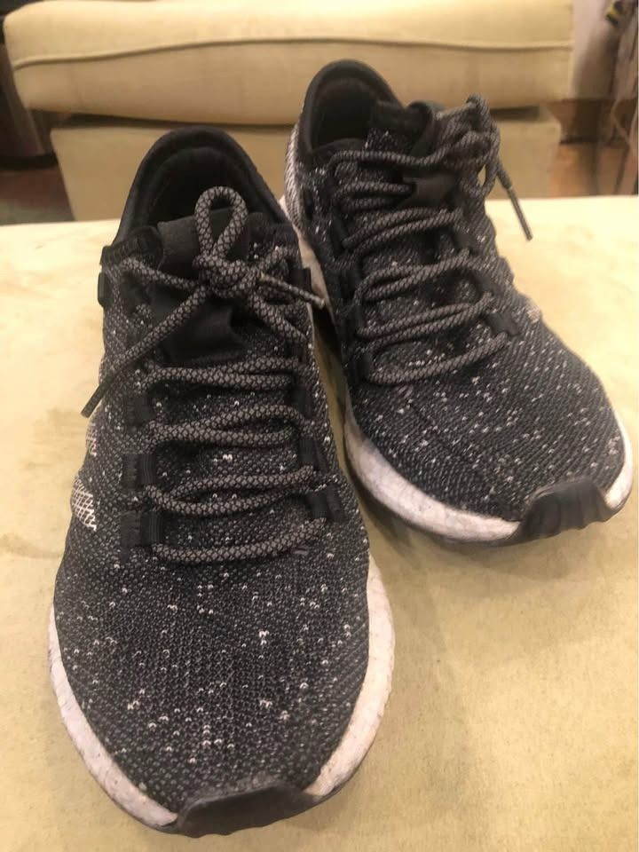 Adidas PureBoost Running Shoes (Category: Sneakers) located in Mandaluyong City. Submitted by ajandriah.s (Listing ID 1462280978, Image 1). Description: - Adidas PureBoost running shoes - Color: Black with white speckles - Comfortable knit upper for a snug fit - Boost midsole provides excellent energy return - Ideal for running and everyday wear - Note: Minor scuffs on midsole due to normal use.