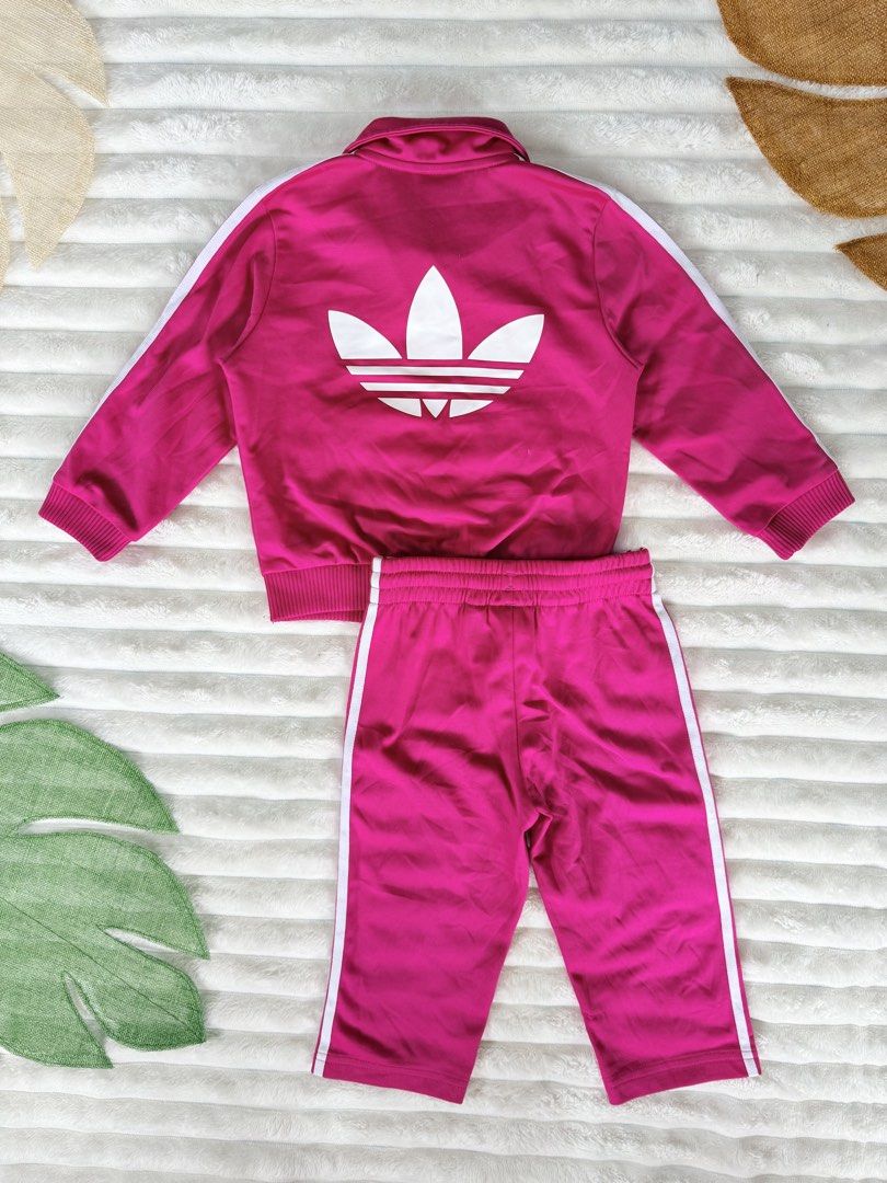 Adidas tracksuit terno pink 24M (Category: Babies & Kids Fashion) located in La Trinidad. Submitted by true_kidsclothing (Listing ID 1462283491, Image 2). Description: 𝙎𝙞𝙯𝙚 𝙤𝙣 𝙩𝙖𝙜: 24 months 💯Legit / Authentic 📌Excellent used condition 📌Color rate: 9.8/10 .