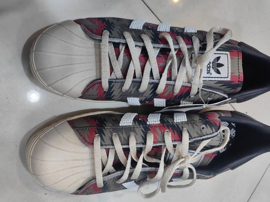 Adidas x Neighborhood NH Shelltoe Superstar (Category: Sneakers) located in Quezon City. Submitted by flat.earther23 (Listing ID 1462292943, Image 3). Description: - Adidas Superstar x Neighborhood collaboration - Classic shelltoe design - Unique patterned upper - Beaded Adidas stripes for a special touch - Includes original tags - Size: 9 US Men's.