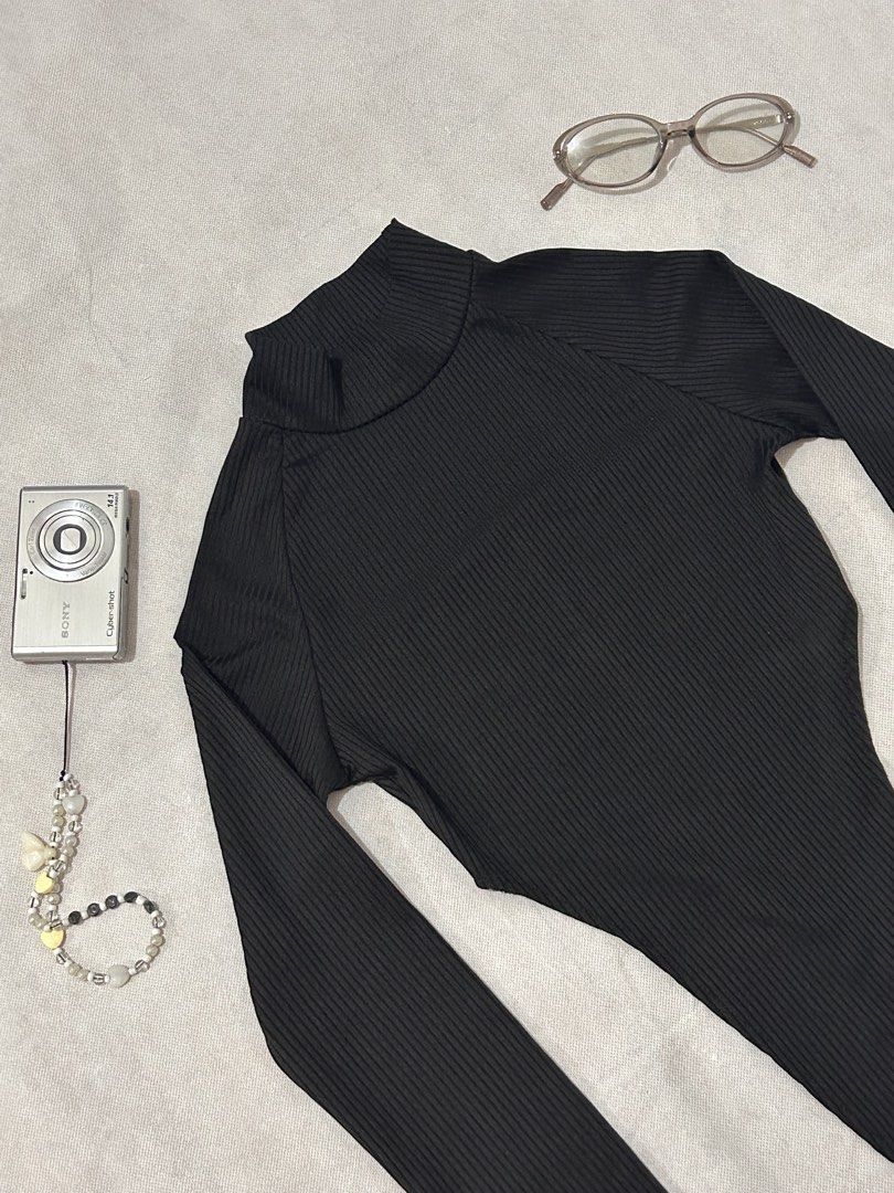 Adika black ribbed mock-neck high-cut bodysuit (Category: Longsleeves) located in Imus. Submitted by donnasaurr19 (Listing ID 1462353306, Image 2). Description: - Size XS on Tag but can fit to SMALL - Unused.