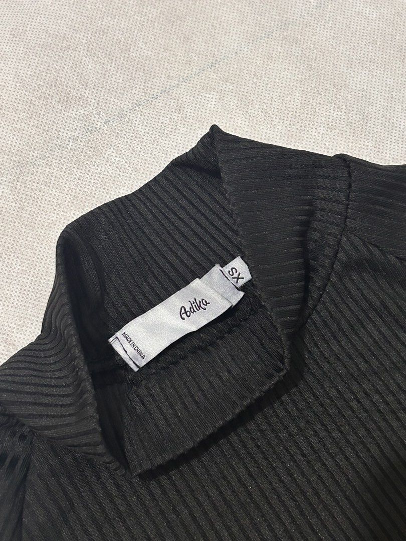 Adika black ribbed mock-neck high-cut bodysuit (Category: Longsleeves) located in Imus. Submitted by donnasaurr19 (Listing ID 1462353306, Image 3). Description: - Size XS on Tag but can fit to SMALL - Unused.