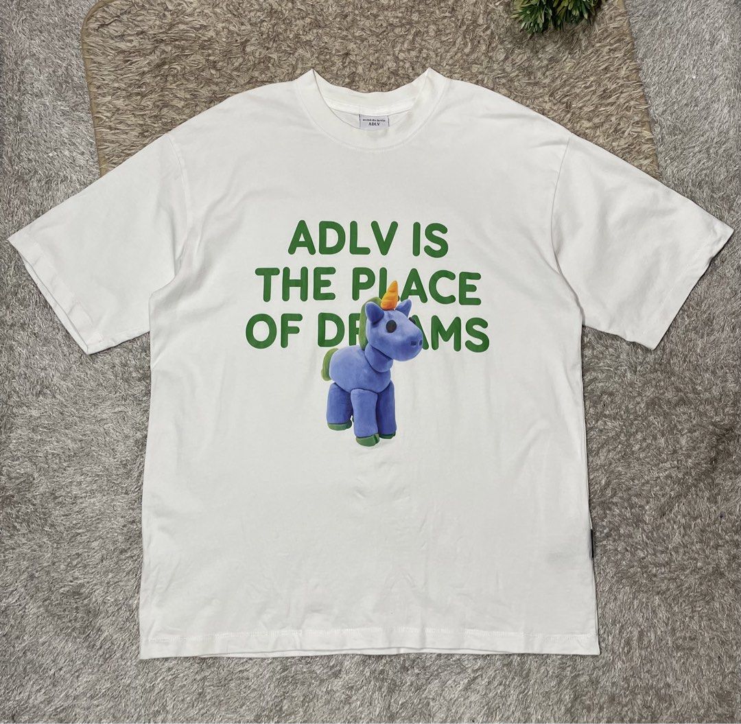 ADLV tee (Category: Tshirts & Polo Shirts ) located in Las Pinas. Submitted by moncaz2461827 (Listing ID 1462380129, Image 1). Description: ADLV oversized tee Size 2 on tag Dimes 23x29 Excellent condition Color rate 9.8/10 No issue .