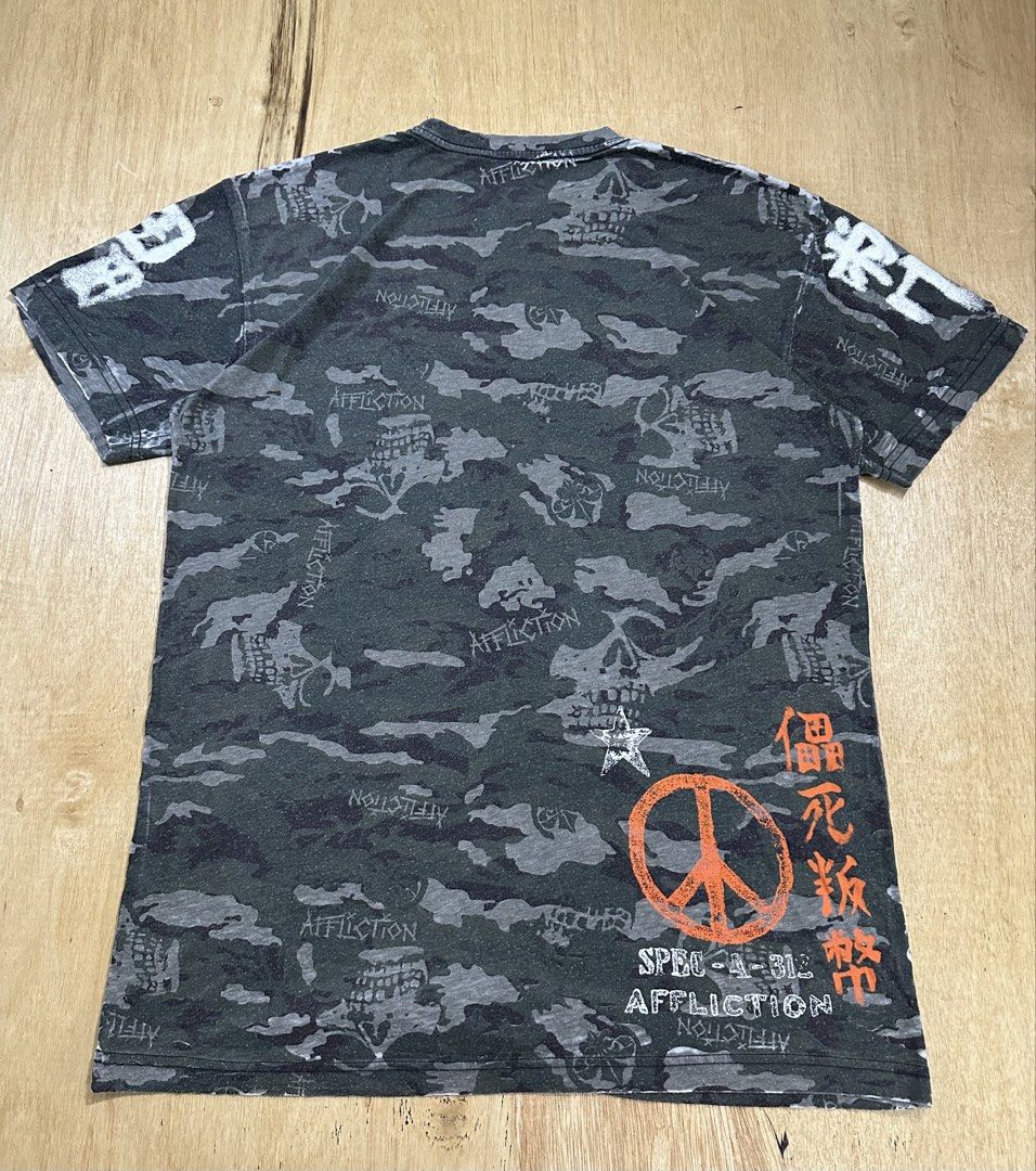 Affliction Grim Reaper Camo Shirt (Category: Tshirts & Polo Shirts ) located in Bacolod City. Submitted by dannnsoy (Listing ID 1462295452, Image 3). Description: Affliction Grim Reaper Camo Shirt •In very good condition •Dimension: 21” x 29” •Issue: Signs of usage •Price: 1399 only 📍Note: Color may vary to due lighting and camera resolution. .