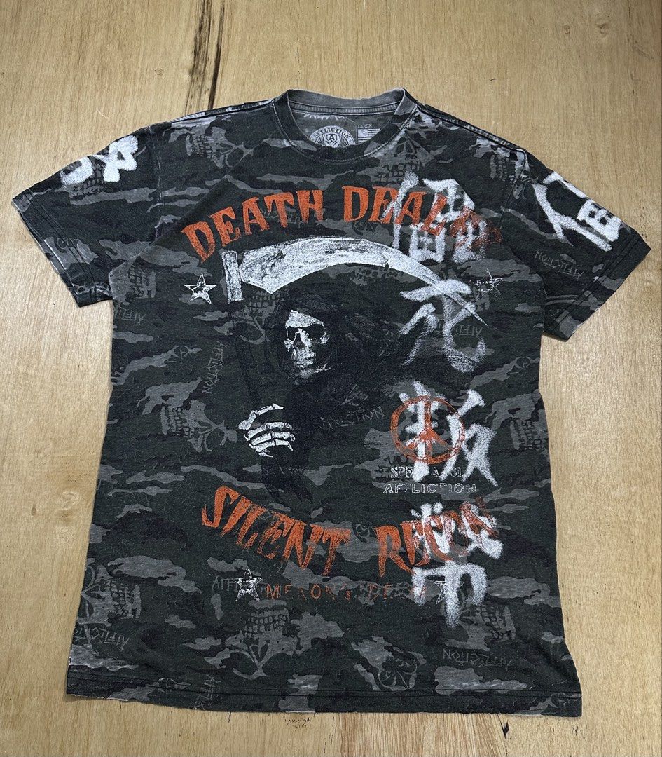 Affliction Grim Reaper Camo Shirt (Category: Tshirts & Polo Shirts ) located in Bacolod City. Submitted by dannnsoy (Listing ID 1462295452, Image 1). Description: Affliction Grim Reaper Camo Shirt •In very good condition •Dimension: 21” x 29” •Issue: Signs of usage •Price: 1399 only 📍Note: Color may vary to due lighting and camera resolution. .