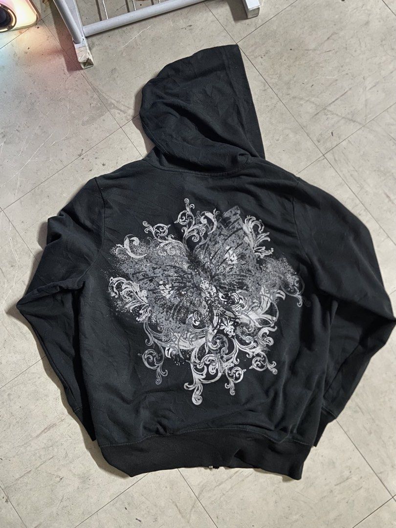 AFFLICTION HOODIE DESIGN VIBE (Category: Coats, Jackets and Outerwear) located in Manila. Submitted by reirapture (Listing ID 1462394874, Image 1). Description: - black zip-up hoodie - Features a striking butterfly graphic on the back - Convenient front pockets - Ideal for casual outfits and easy layering tags: y2k, Emo, grunge, affliction, MMA ELITE, tapout, XTREME COUTURE, juicy couture, punk, bimbo, MAY TAWAD SA CUTE.