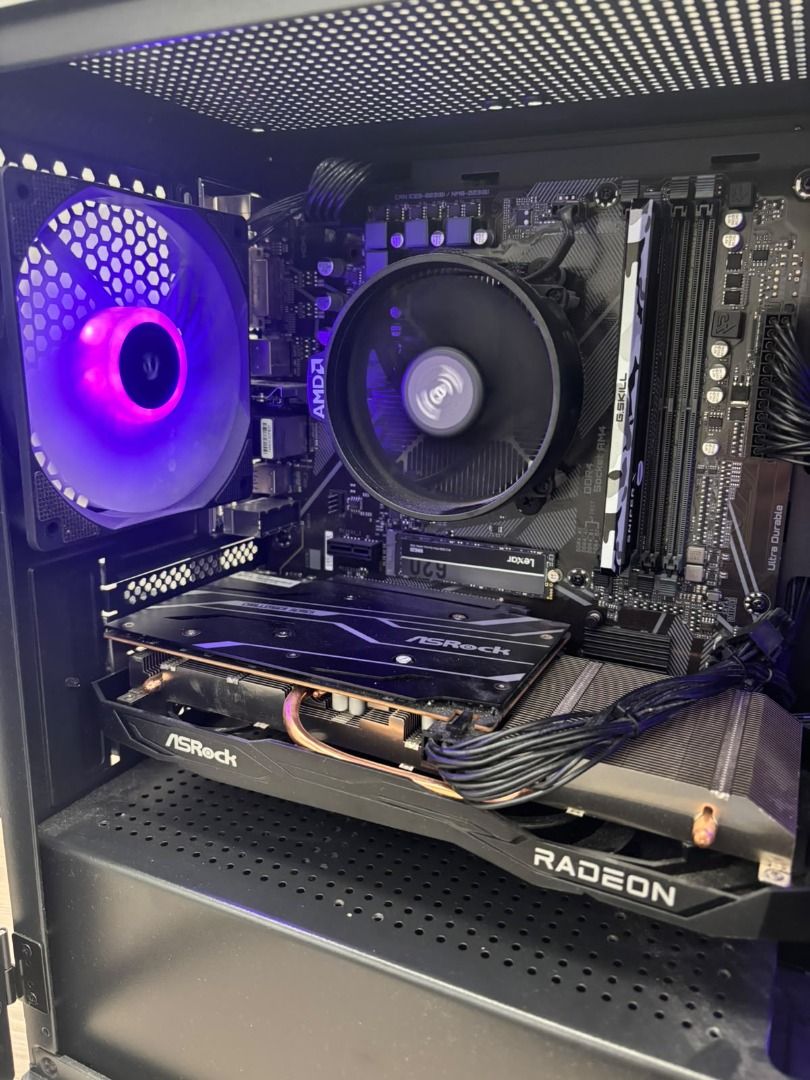 Aftershock PC Desktop Computer (Category: Desktops) located in Singapore. Submitted by swiftriver.8cbbd6 (Listing ID 1462315559, Image 2). Description: AMD Ryzen 5 5600 Gaming Desktop Strictly as-is-where-is sale. Specs: - Processor: AMD Ryzen 5 5600 (6 Cores / 12 Threads) - Graphics Card: AMD Radeon RX 6600 8GB - RAM: Not provided (DDR4 memory only) - Storage: 512GB Lexar NM620 M.2 2280 NVME SSD - Motherboard: Gigabyte A520M DS3H AC - Operating 