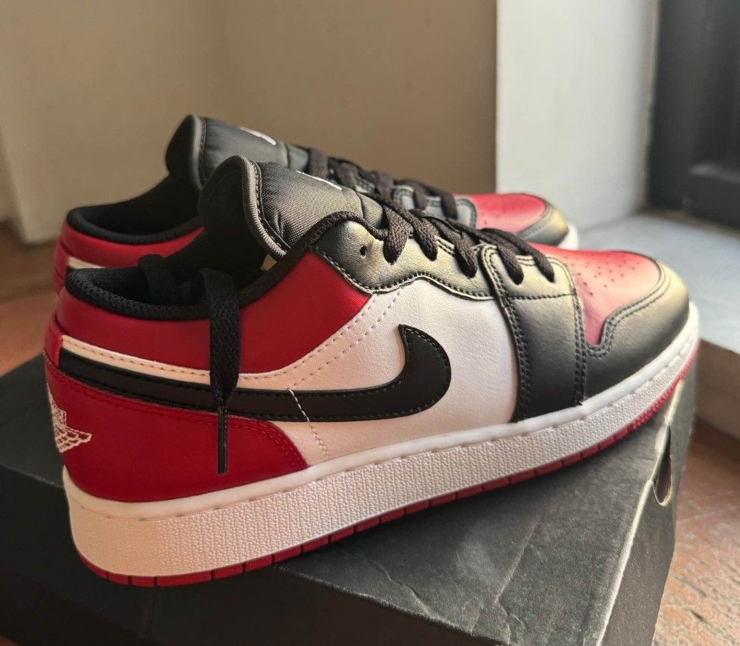 Air Jordan 1 Low breds (Category: Sneakers) located in Quezon City. Submitted by Qualityuseditems (Listing ID 1462399515, Image 3). Description: - Air Jordan 1 Low breds - Classic Gym Red, White, and Black colorway - Size: 7Y (US Youth) - Includes original box - Ideal for everyday use or sneaker collectors.