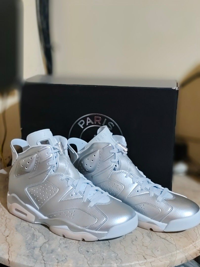 Air Jordan 6 Retro PSG Metallic Silver (Category: Sneakers) located in Manila. Submitted by silverfish-b79e (Listing ID 1462266396, Image 2). Description: - Air Jordan 6 Retro PSG - Metallic Silver colorway - Includes original box - Features Paris Saint-Germain branding - Lace locks with Jumpman logo - Ideal for sneaker collectors.