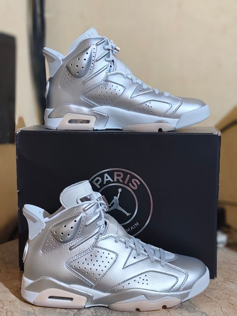 Air Jordan 6 Retro PSG Metallic Silver (Category: Sneakers) located in Manila. Submitted by silverfish-b79e (Listing ID 1462266396, Image 1). Description: - Air Jordan 6 Retro PSG - Metallic Silver colorway - Includes original box - Features Paris Saint-Germain branding - Lace locks with Jumpman logo - Ideal for sneaker collectors.