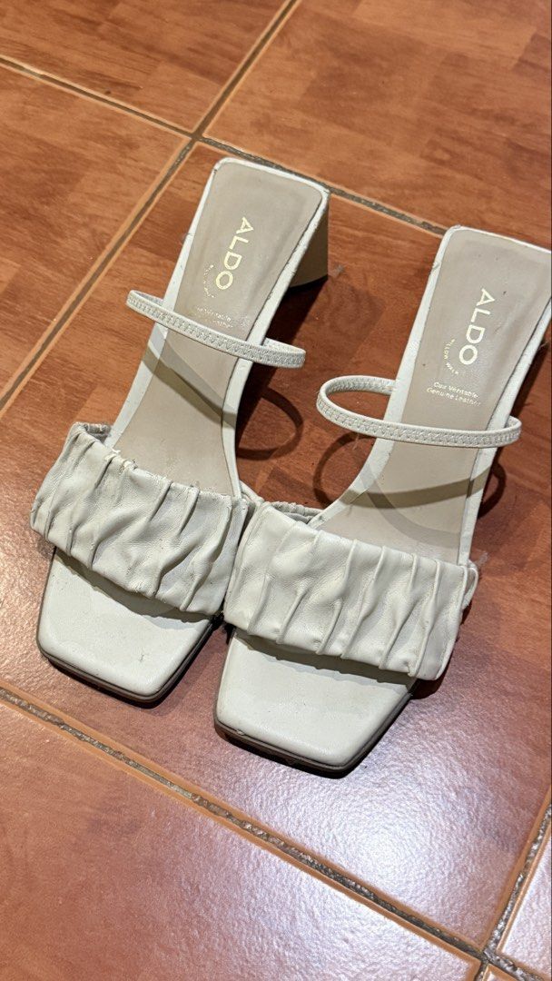 ALDO Block Heels Sandals (Category: Heels) located in Quezon City. Submitted by beabeys (Listing ID 1462314885, Image 2). Description: - White ALDO sandals - Chic ruched strap detail - Trendy square toe - Comfortable block heel - Easy slip-on style - Versatile for dressing up or down - Ideal for any occasion Issues: peeling .