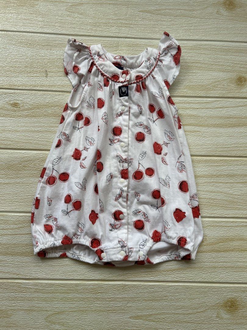 Allo & Lugh romper (Category: Babies & Kids Fashion) located in Cebu City. Submitted by yjainani (Listing ID 1462351785, Image 1). Description: cute white baby romper featuring an all-over red cherry print and delicate ruffled cap sleeves.