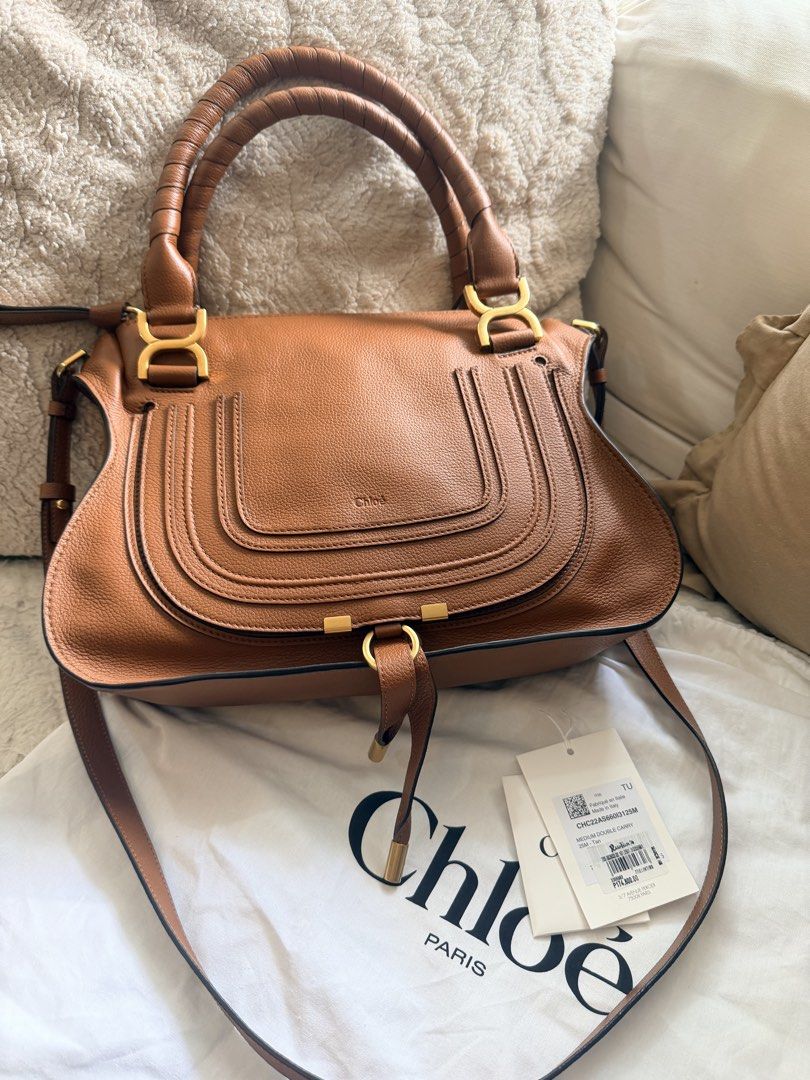 Almost new Chloe Medium Double Carry Tan (Category: Cross-body Bags) located in Makati City. Submitted by georgiaetc (Listing ID 1462307877, Image 1). Description: Almost new Excellent condition Rustans retail price is 174k With dustbag , and cards.