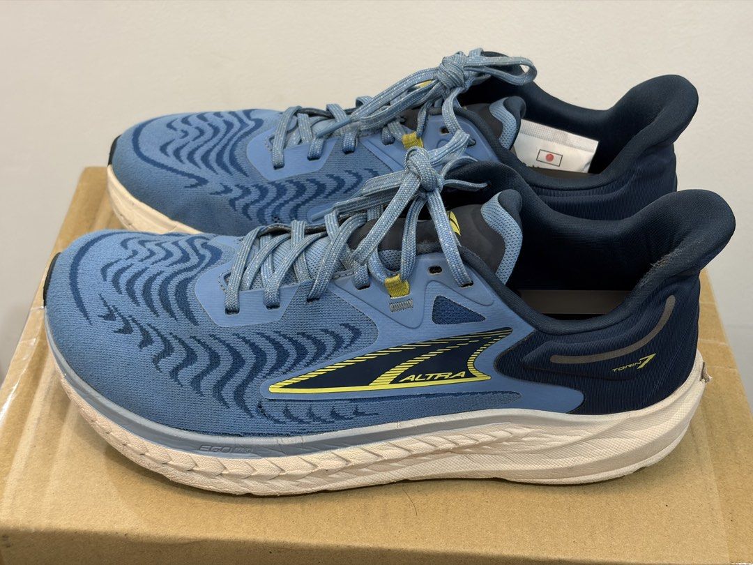 Altra Torin 7 Blue Running Shoes (Category: Sneakers) located in Manila. Submitted by imaooo (Listing ID 1462354400, Image 1). Description: - Altra Torin 7 running shoes in Blue - Lightweight and comfortable for your runs - Excellent grip from the outsole - Shows some signs of wear on soles and uppers from previous use - Ready for your next running adventure - Negotiable price.