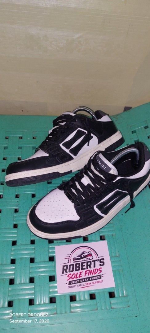 AMIRI Black and White Leather Sneakers (Category: Sneakers) located in Candelaria. Submitted by RHOBZ29 (Listing ID 1462395335, Image 3). Description: - Brand: AMIRI - Color: Black and White - Material: Leather - Closure: Lace-up - Style: Classic low-top, great for casual wear UKAY SOURCE ONLY .