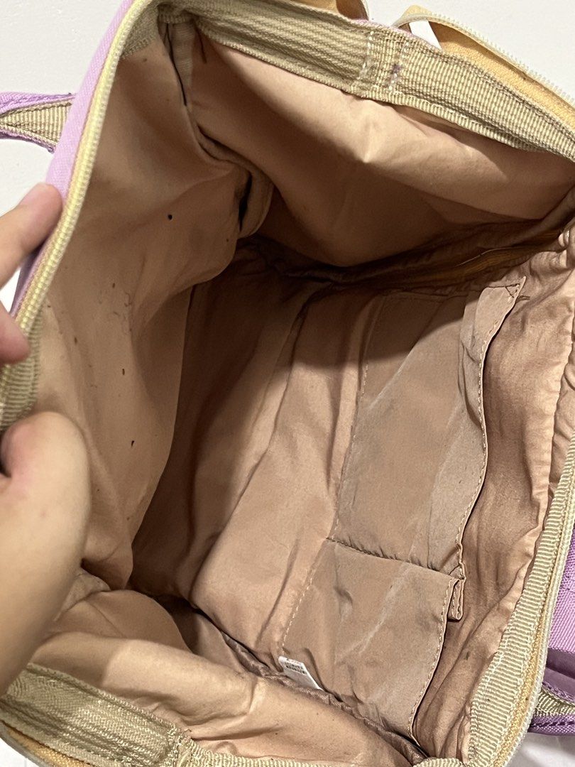 Anello Backpack Lavender Purple (Category: Backpacks) located in Manila. Submitted by lai.p (Listing ID 1462374229, Image 3). Description: - Anello backpack in a beautiful lavender purple. - Classic design with a convenient front zipper pocket. - Main compartment opens wide for easy access. - Padded straps for comfortable carrying. - Shows minor marks inside and on the front pocket. - Still has plenty of life left for your adventures!.