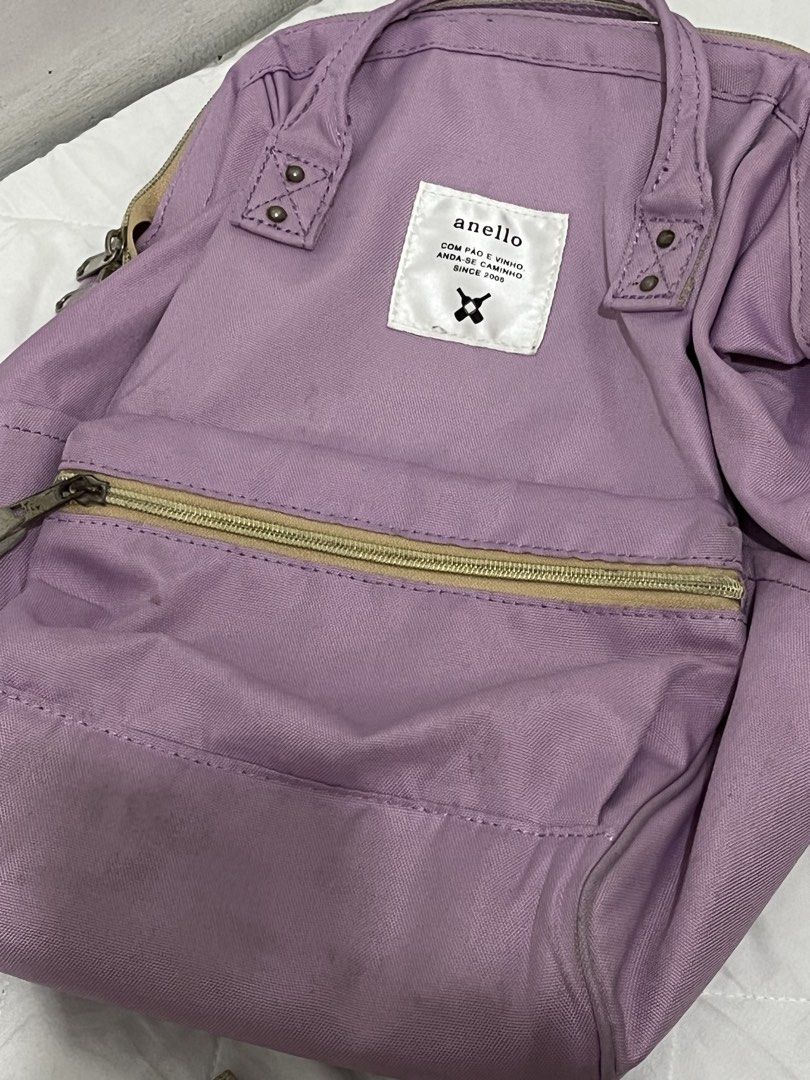 Anello Backpack Lavender Purple (Category: Backpacks) located in Manila. Submitted by lai.p (Listing ID 1462374229, Image 1). Description: - Anello backpack in a beautiful lavender purple. - Classic design with a convenient front zipper pocket. - Main compartment opens wide for easy access. - Padded straps for comfortable carrying. - Shows minor marks inside and on the front pocket. - Still has plenty of life left for your adventures!.