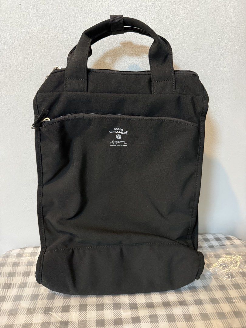 Anello Grande Backpack Black (Category: Backpacks) located in Manila. Submitted by sarj09732 (Listing ID 1462419627, Image 1). Description: - Black Anello Grande backpack - Features both top handles and adjustable backpack straps - Convenient front zip pocket for quick access items - Main compartment zips open for secure storage - Ample space inside, perfect for everyday essentials and more.