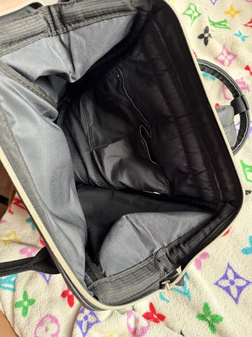 Anello Small Black Leather Backpack (Category: Backpacks) located in Quezon City. Submitted by krtstn (Listing ID 1462289593, Image 3). Description: - Black faux leather backpack - Main compartment with internal pockets - Front zipper pocket - Side pockets - Adjustable straps - Ideal for everyday use or travel - Bought in Japan.
