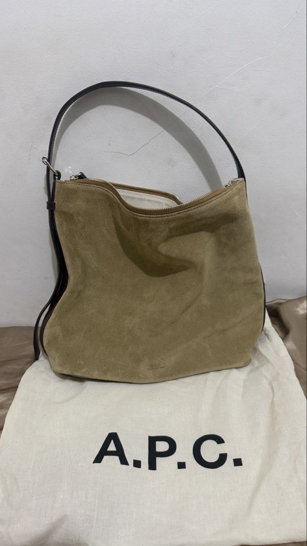 A.P.C. Suede Vera Shoulder Bag (Category: Luxury Bags & Wallets) located in Manila. Submitted by shoegirl007 (Listing ID 1462279231, Image 3). Description: - Brand: A.P.C. - Material: Tan Suede - Closure: Zipper - Interior: Multiple slip pockets - Includes: Original dust bag - Style: Shoulder bag - Ideal for: Everyday use.