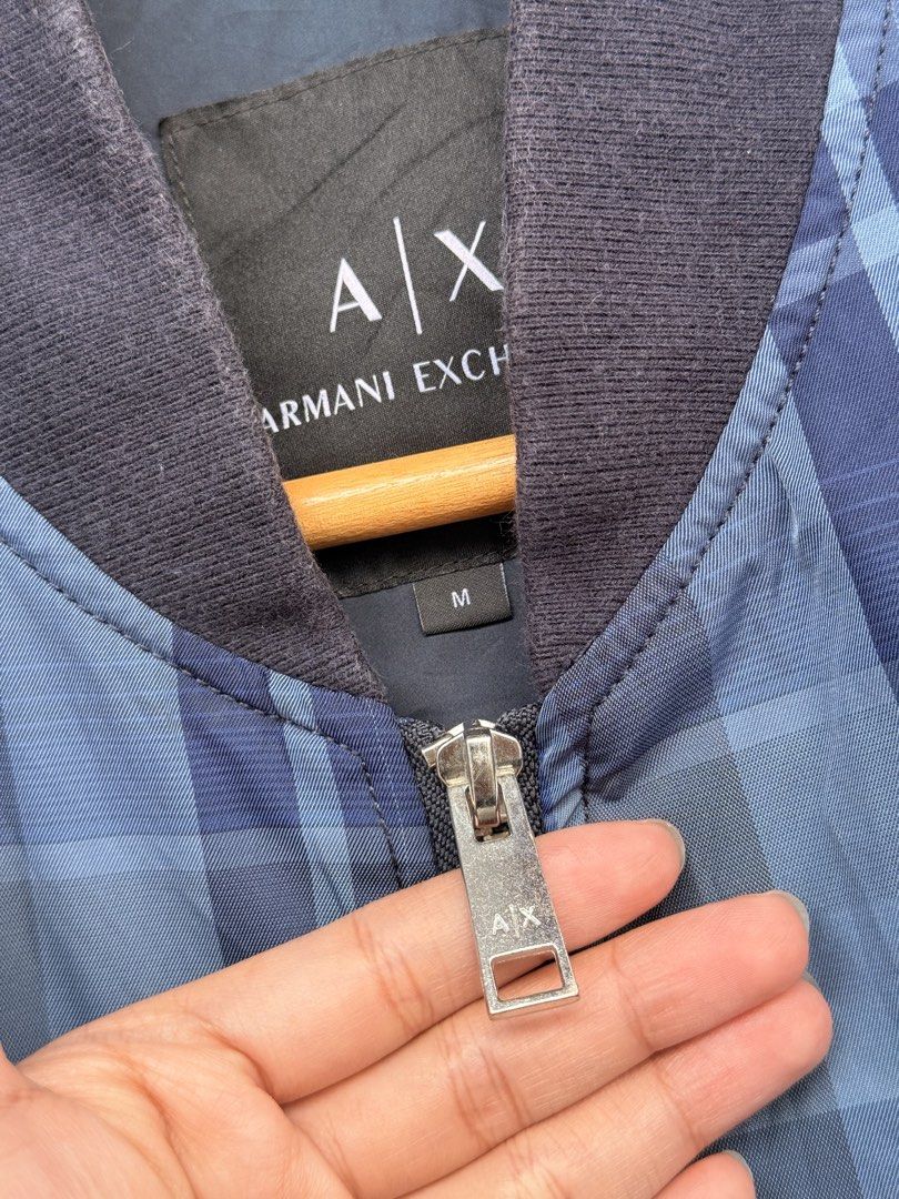 Armani Exchange (Category: Coats, Jackets and Outerwear) located in Baguio. Submitted by mardimercredi14 (Listing ID 1462312990, Image 3). Description: 🔥 Armani Exchange Dimensions: 22*27 Condition: very good Color Rate: 9 ❌ slightly faded garters.